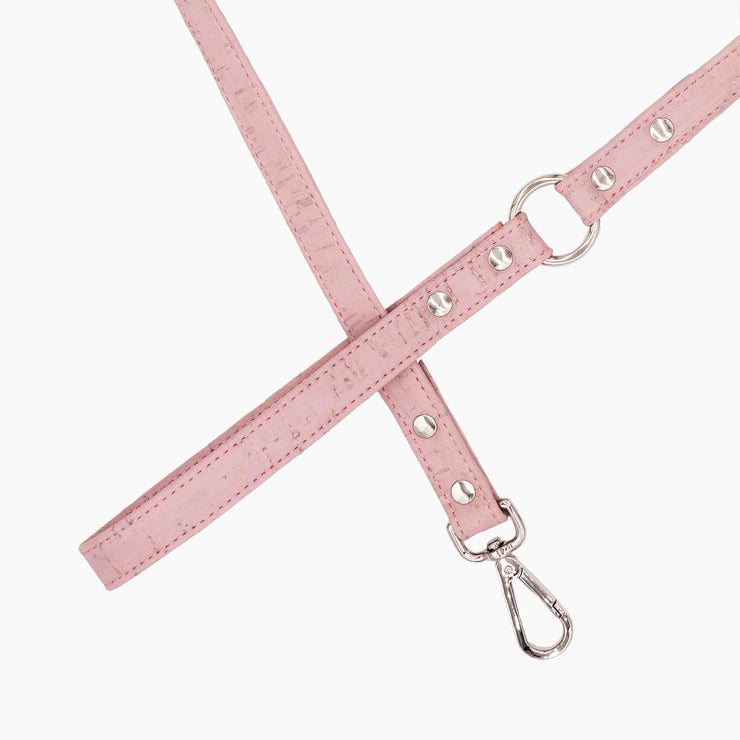 Shop our vegan leather pink cork pet leash, a cruelty-free and sustainable pet accessory for your beloved pet. Made from eco-friendly materials, this dog and cat leash combines style and ethics, perfect for conscious pet owners. Cruelty-free, luxury dog leash, unique pet leash, boho chic pet accessories, premium leashes, organic look, ethically made, handmade in the USA, LGBTQIA woman-owned, for the fashion dog. 
