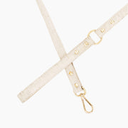 Shop our vegan leather white cork pet leash, a cruelty-free and sustainable pet accessory for your beloved pet. Made from eco-friendly materials, this dog and cat leash combines style and ethics, perfect for conscious pet owners. Cruelty-free, luxury dog leash, unique pet leash, boho chic pet accessories, premium leashes, organic look, ethically made, handmade in the USA, LGBTQIA woman-owned, for the fashion dog. #color_gold-color
