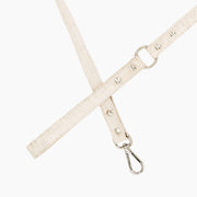 Shop our vegan leather white cork pet leash, a cruelty-free and sustainable pet accessory for your beloved pet. Made from eco-friendly materials, this dog and cat leash combines style and ethics, perfect for conscious pet owners. Cruelty-free, luxury dog leash, unique pet leash, boho chic pet accessories, premium leashes, organic look, ethically made, handmade in the USA, LGBTQIA woman-owned, for the fashion dog. #color_silver-color