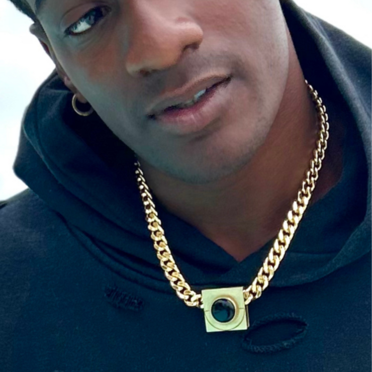 DIPHDA Iconic Onyx Moon Necklace - 18K Gold thick curb chain - bold high quality jewelry on male model.