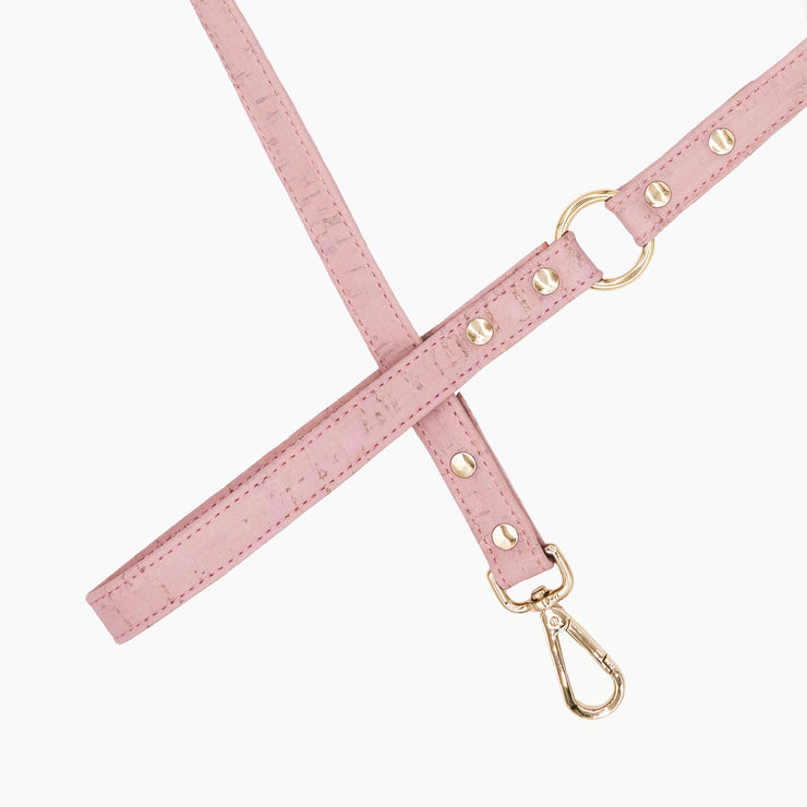 Shop our vegan leather pink cork pet leash, a cruelty-free and sustainable pet accessory for your beloved pet. Made from eco-friendly materials, this dog and cat leash combines style and ethics, perfect for conscious pet owners. Cruelty-free, luxury dog leash, unique pet leash, boho chic pet accessories, premium leashes, organic look, ethically made, handmade in the USA, LGBTQIA woman-owned, for the fashion dog. 