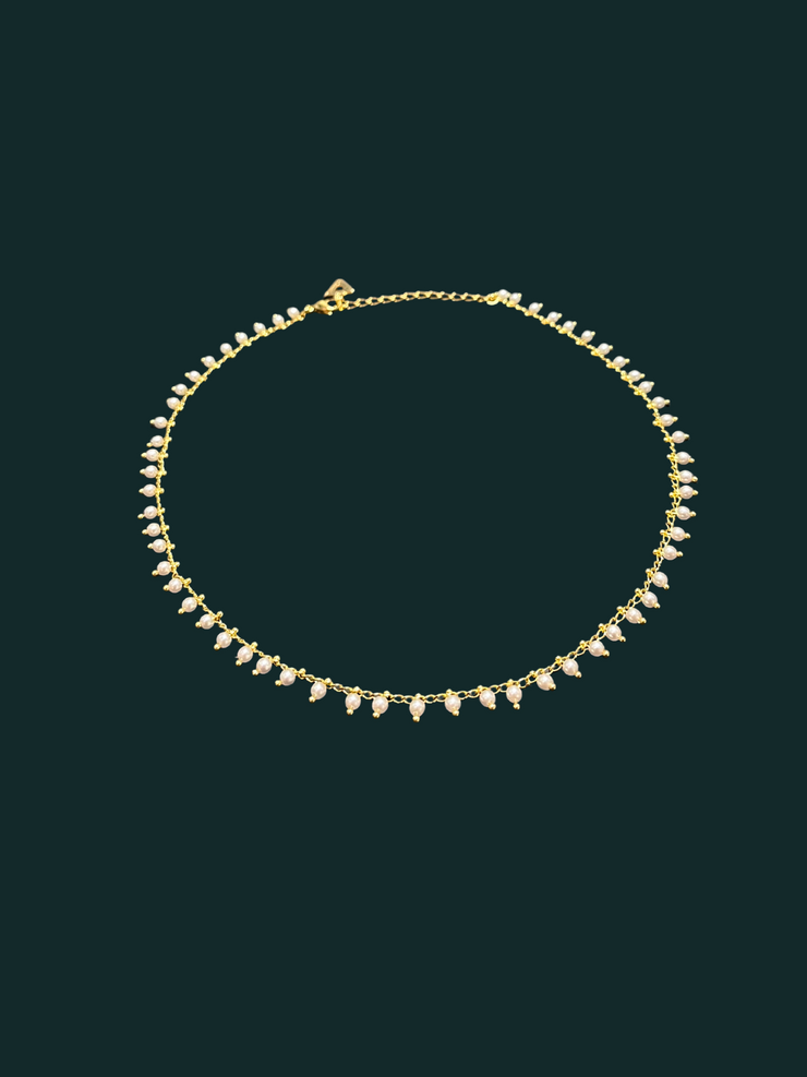 DIPHDA Mini Marie Necklace with delicate pearls on a dainty chain—layered at the collarbone for a soft, feminine, and elegant look. Handmade in Los Angeles.
