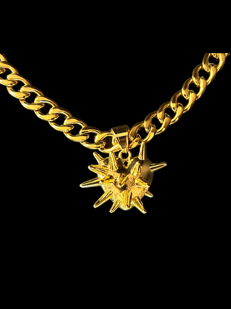 DIPHDA Slayed Heart Necklace with spike heart pendant on flat curb chain, available in gold or stainless steel—bold unisex statement jewelry handcrafted in LA.