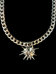 DIPHDA Slayed Heart Necklace with spike heart pendant on flat curb chain, available in gold or stainless steel—bold unisex statement jewelry handcrafted in LA.