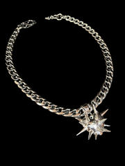 DIPHDA Slayed Heart Necklace with spike heart pendant on flat curb chain, available in gold or stainless steel—bold unisex statement jewelry handcrafted in LA.