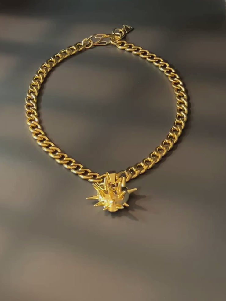 DIPHDA Slayed Heart Necklace with spike heart pendant on flat curb chain, available in gold or stainless steel—bold unisex statement jewelry handcrafted in LA.